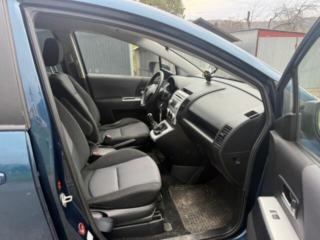 Зеленый Мазда 5, объемом двигателя 2 л и пробегом 310 тыс. км за 2000 $, фото 6 на Automoto.ua