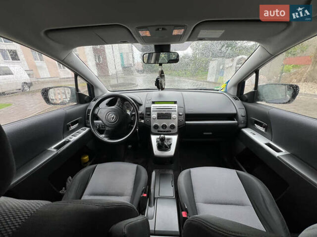 Зеленый Мазда 5, объемом двигателя 2 л и пробегом 243 тыс. км за 5350 $, фото 4 на Automoto.ua