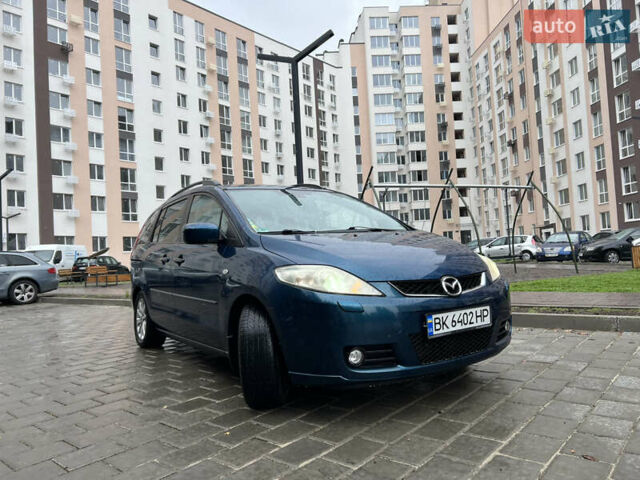 Зеленый Мазда 5, объемом двигателя 2 л и пробегом 243 тыс. км за 5350 $, фото 1 на Automoto.ua