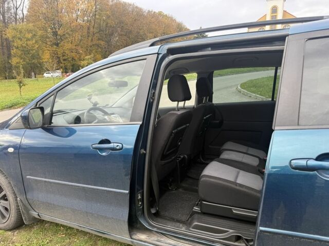 Зеленый Мазда 5, объемом двигателя 2 л и пробегом 310 тыс. км за 2000 $, фото 7 на Automoto.ua