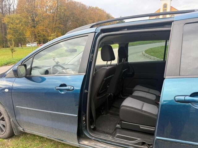 Зелений Мазда 5, об'ємом двигуна 2 л та пробігом 263 тис. км за 2000 $, фото 6 на Automoto.ua