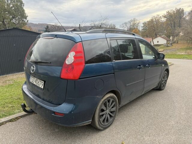Зеленый Мазда 5, объемом двигателя 2 л и пробегом 310 тыс. км за 2000 $, фото 3 на Automoto.ua