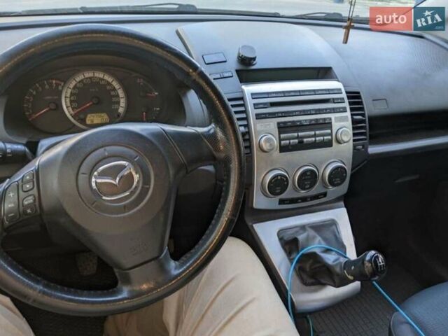 Зеленый Мазда 5, объемом двигателя 2 л и пробегом 250 тыс. км за 5000 $, фото 6 на Automoto.ua
