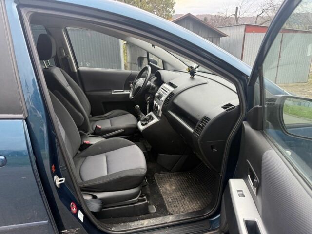 Зелений Мазда 5, об'ємом двигуна 2 л та пробігом 256 тис. км за 1990 $, фото 5 на Automoto.ua