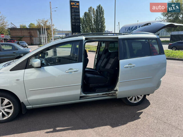 Зеленый Мазда 5, объемом двигателя 2 л и пробегом 338 тыс. км за 3800 $, фото 4 на Automoto.ua