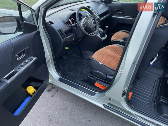 Зелений Мазда 5, об'ємом двигуна 2 л та пробігом 280 тис. км за 6000 $, фото 32 на Automoto.ua