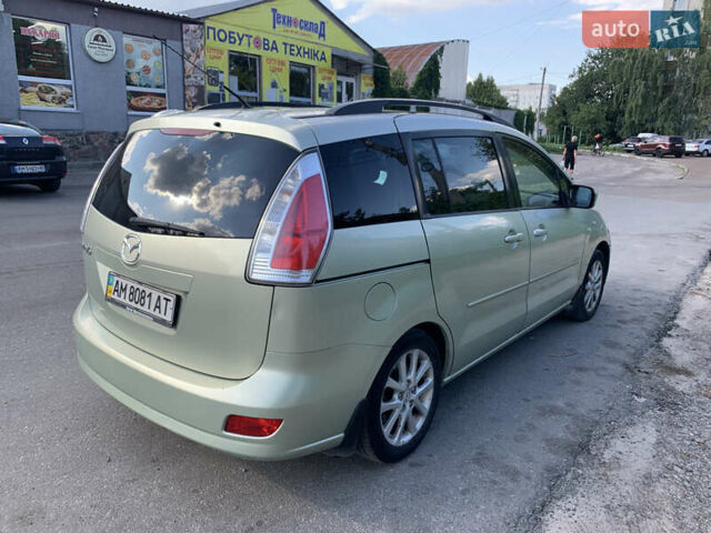 Зеленый Мазда 5, объемом двигателя 2 л и пробегом 295 тыс. км за 6400 $, фото 3 на Automoto.ua