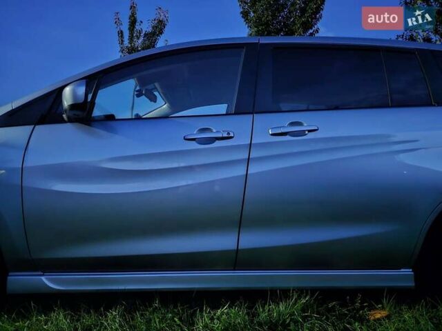 Зеленый Мазда 5, объемом двигателя 1.6 л и пробегом 186 тыс. км за 8000 $, фото 1 на Automoto.ua