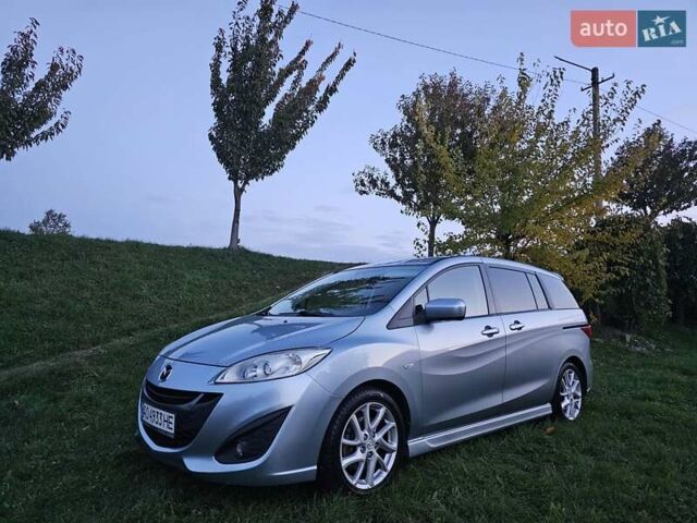 Зеленый Мазда 5, объемом двигателя 1.6 л и пробегом 186 тыс. км за 8000 $, фото 34 на Automoto.ua