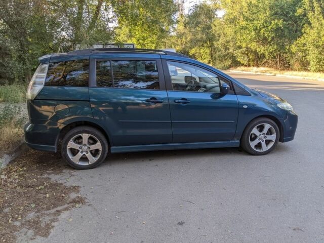 Зеленый Мазда 5, объемом двигателя 2 л и пробегом 250 тыс. км за 4942 $, фото 1 на Automoto.ua