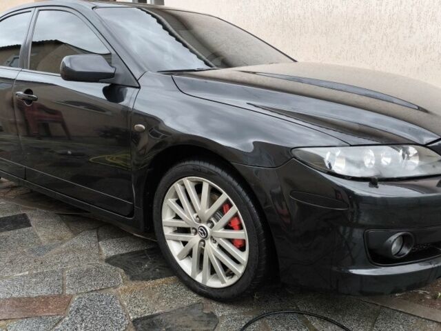 Черный Мазда 6 МПС, объемом двигателя 2.3 л и пробегом 228 тыс. км за 6500 $, фото 1 на Automoto.ua