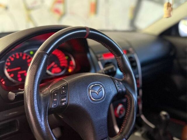 Черный Мазда 6 МПС, объемом двигателя 2.3 л и пробегом 205 тыс. км за 7400 $, фото 3 на Automoto.ua