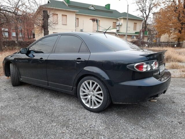 Чорний Мазда 6 МПС, об'ємом двигуна 2.3 л та пробігом 163 тис. км за 6000 $, фото 1 на Automoto.ua