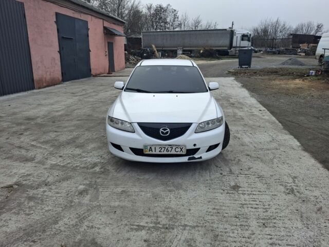 Білий Мазда 6, об'ємом двигуна 2 л та пробігом 425 тис. км за 1500 $, фото 1 на Automoto.ua