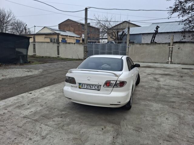 Білий Мазда 6, об'ємом двигуна 2 л та пробігом 425 тис. км за 1500 $, фото 3 на Automoto.ua