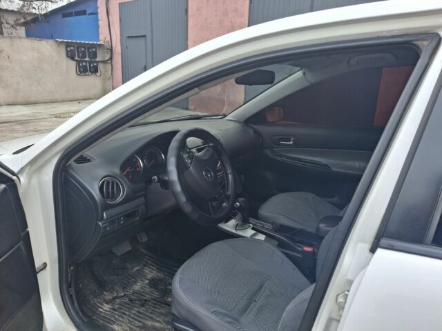 Білий Мазда 6, об'ємом двигуна 2 л та пробігом 425 тис. км за 1500 $, фото 6 на Automoto.ua