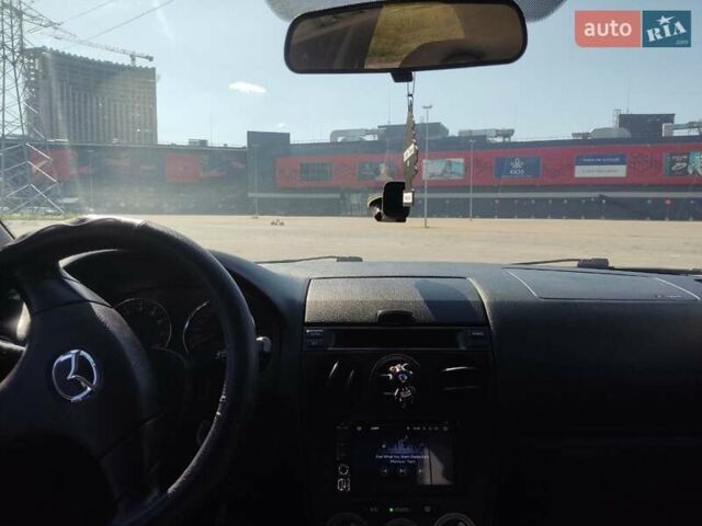 Білий Мазда 6, об'ємом двигуна 2 л та пробігом 180 тис. км за 5500 $, фото 3 на Automoto.ua