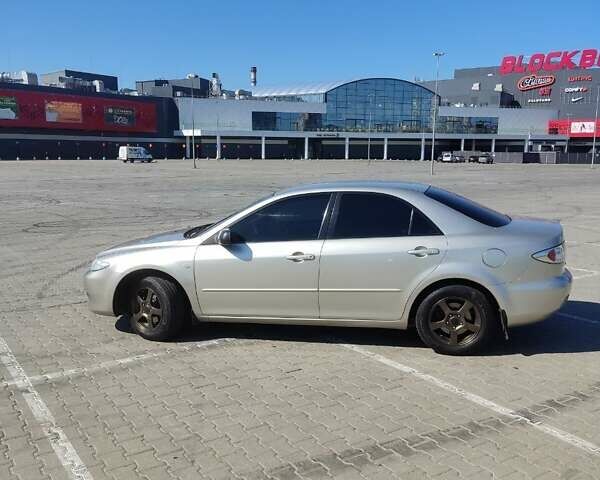 Білий Мазда 6, об'ємом двигуна 2 л та пробігом 180 тис. км за 5500 $, фото 2 на Automoto.ua