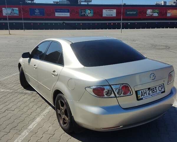 Білий Мазда 6, об'ємом двигуна 2 л та пробігом 180 тис. км за 5500 $, фото 1 на Automoto.ua