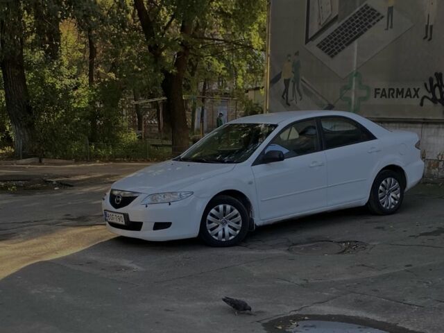 Белый Мазда 6, объемом двигателя 1.8 л и пробегом 165 тыс. км за 1064 $, фото 5 на Automoto.ua