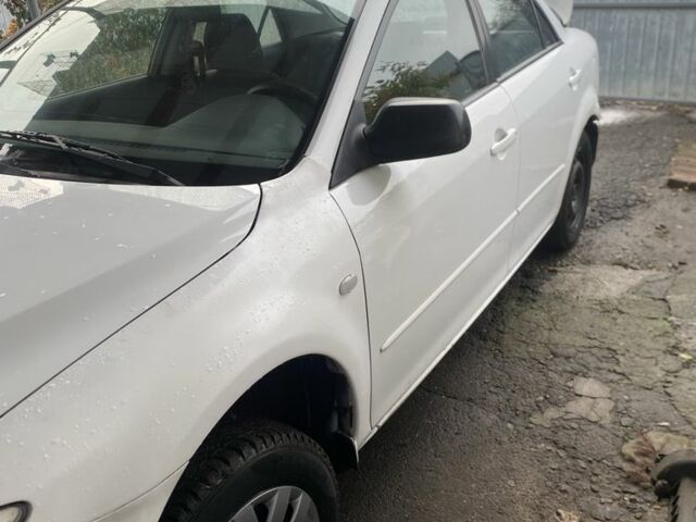 Белый Мазда 6, объемом двигателя 1.8 л и пробегом 165 тыс. км за 1064 $, фото 1 на Automoto.ua