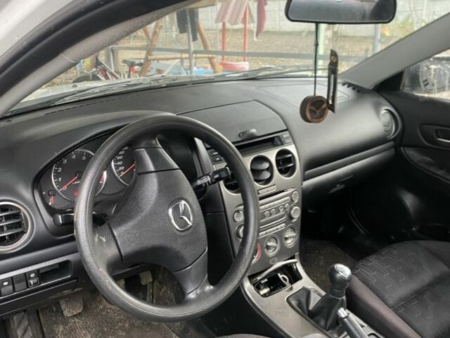 Белый Мазда 6, объемом двигателя 1.8 л и пробегом 165 тыс. км за 1064 $, фото 3 на Automoto.ua