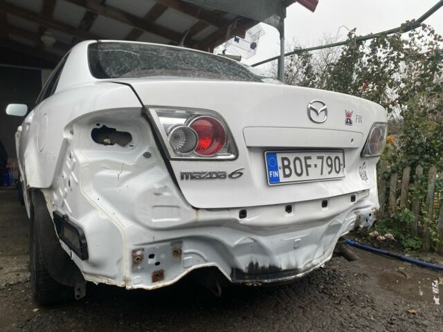 Белый Мазда 6, объемом двигателя 1.8 л и пробегом 165 тыс. км за 1064 $, фото 2 на Automoto.ua