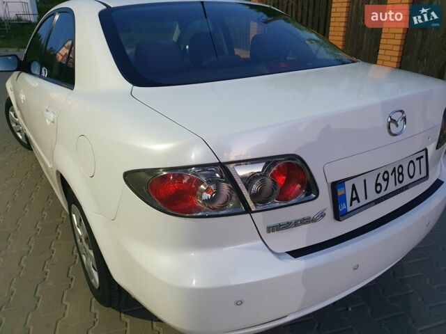 Белый Мазда 6, объемом двигателя 2 л и пробегом 189 тыс. км за 6100 $, фото 20 на Automoto.ua