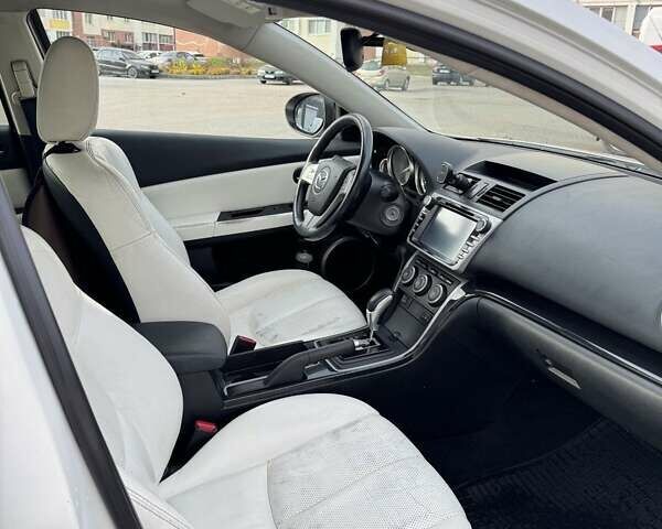 Белый Мазда 6, объемом двигателя 2 л и пробегом 317 тыс. км за 6500 $, фото 9 на Automoto.ua