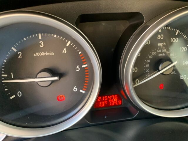 Білий Мазда 6, об'ємом двигуна 2.2 л та пробігом 215 тис. км за 5500 $, фото 16 на Automoto.ua