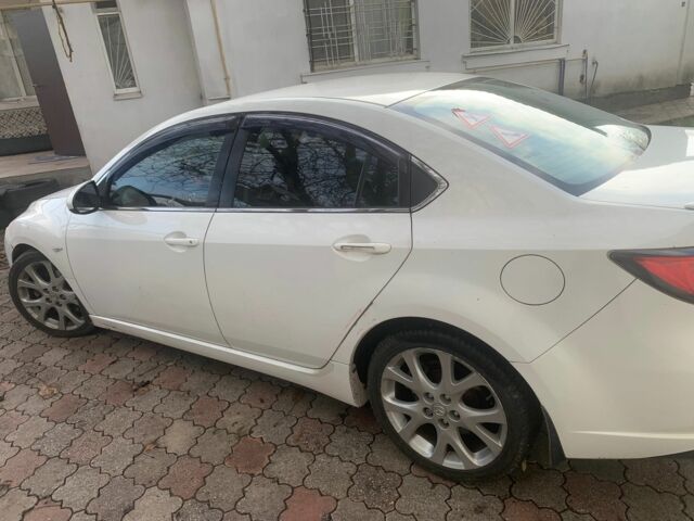 Білий Мазда 6, об'ємом двигуна 2.2 л та пробігом 215 тис. км за 5500 $, фото 7 на Automoto.ua