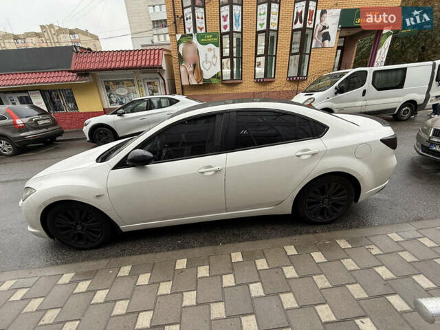 Білий Мазда 6, об'ємом двигуна 2 л та пробігом 264 тис. км за 6599 $, фото 2 на Automoto.ua