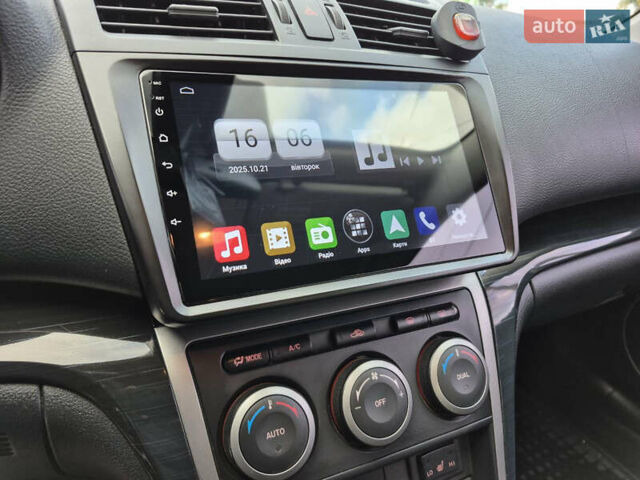 Білий Мазда 6, об'ємом двигуна 2 л та пробігом 236 тис. км за 9200 $, фото 12 на Automoto.ua
