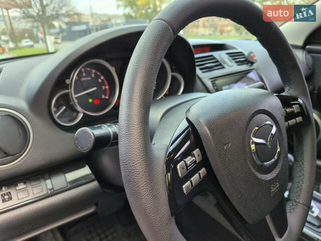Білий Мазда 6, об'ємом двигуна 2 л та пробігом 236 тис. км за 9200 $, фото 11 на Automoto.ua