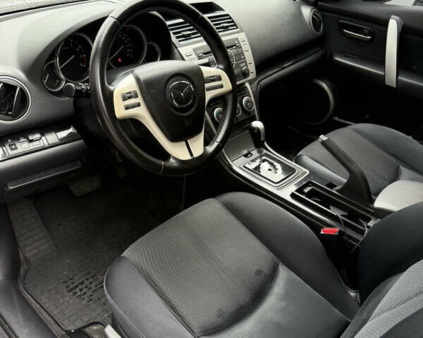 Білий Мазда 6, об'ємом двигуна 2 л та пробігом 264 тис. км за 6599 $, фото 9 на Automoto.ua