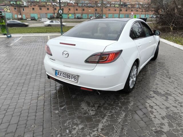 Білий Мазда 6, об'ємом двигуна 2 л та пробігом 185 тис. км за 7200 $, фото 7 на Automoto.ua
