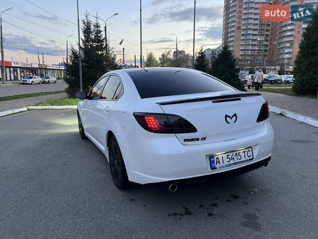Білий Мазда 6, об'ємом двигуна 2 л та пробігом 266 тис. км за 6600 $, фото 9 на Automoto.ua
