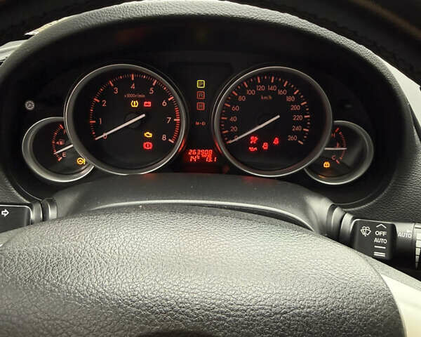 Білий Мазда 6, об'ємом двигуна 2 л та пробігом 264 тис. км за 6599 $, фото 6 на Automoto.ua