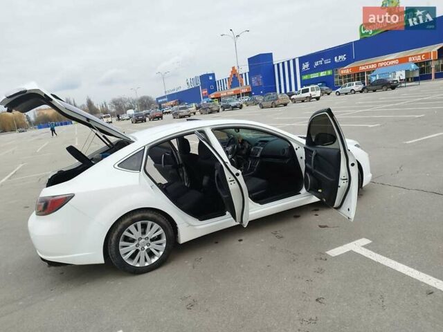 Белый Мазда 6, объемом двигателя 2 л и пробегом 300 тыс. км за 7050 $, фото 14 на Automoto.ua