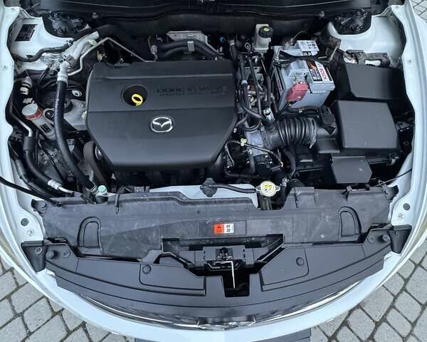 Білий Мазда 6, об'ємом двигуна 2 л та пробігом 165 тис. км за 8000 $, фото 11 на Automoto.ua