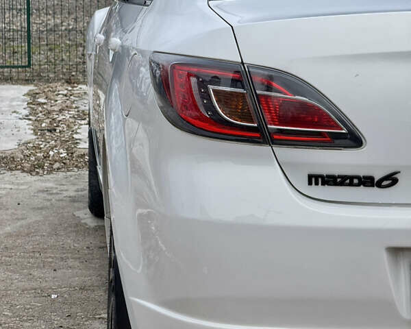 Білий Мазда 6, об'ємом двигуна 2 л та пробігом 182 тис. км за 7500 $, фото 70 на Automoto.ua
