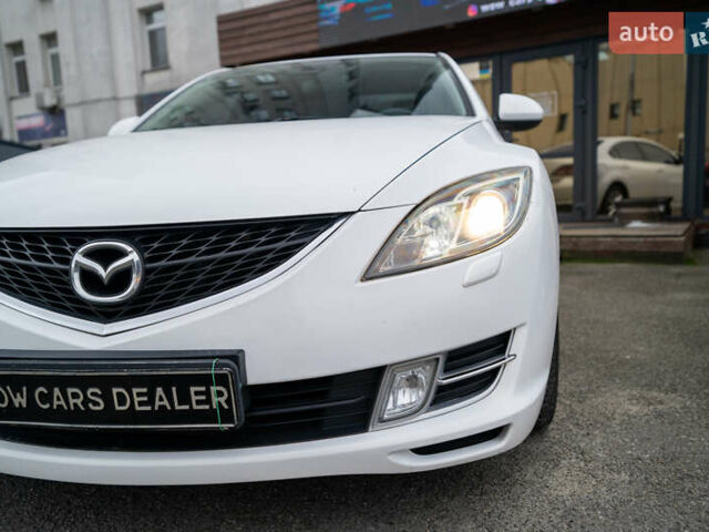 Білий Мазда 6, об'ємом двигуна 2 л та пробігом 197 тис. км за 7999 $, фото 7 на Automoto.ua