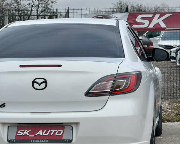 Білий Мазда 6, об'ємом двигуна 2 л та пробігом 182 тис. км за 7500 $, фото 60 на Automoto.ua