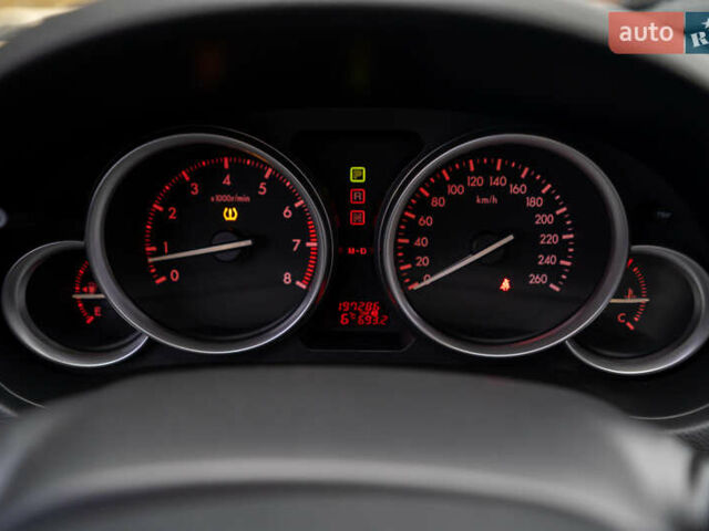 Білий Мазда 6, об'ємом двигуна 2 л та пробігом 197 тис. км за 7800 $, фото 24 на Automoto.ua