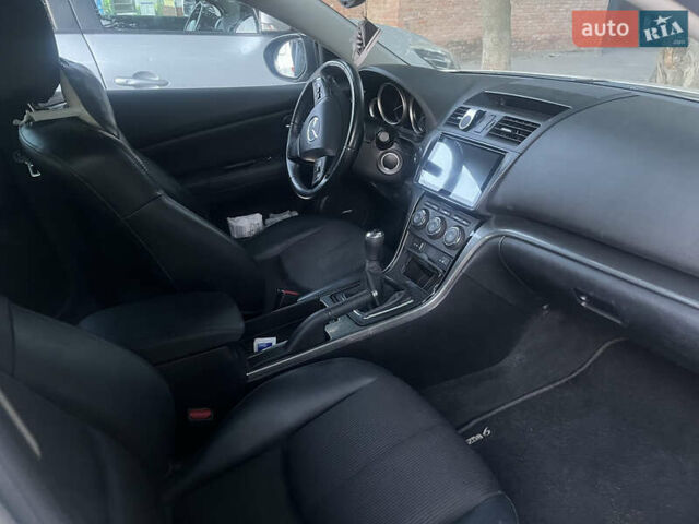 Белый Мазда 6, объемом двигателя 2.18 л и пробегом 245 тыс. км за 6666 $, фото 8 на Automoto.ua