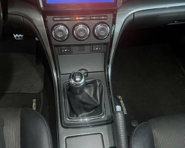 Белый Мазда 6, объемом двигателя 2.18 л и пробегом 245 тыс. км за 6666 $, фото 12 на Automoto.ua