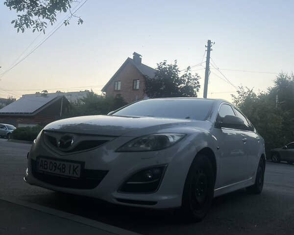 Белый Мазда 6, объемом двигателя 2.18 л и пробегом 245 тыс. км за 6666 $, фото 1 на Automoto.ua