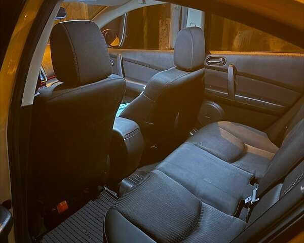 Білий Мазда 6, об'ємом двигуна 2 л та пробігом 101 тис. км за 10000 $, фото 3 на Automoto.ua