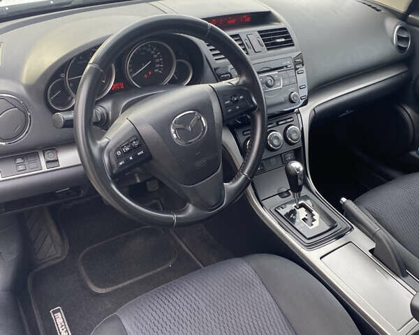 Белый Мазда 6, объемом двигателя 2 л и пробегом 165 тыс. км за 7800 $, фото 4 на Automoto.ua