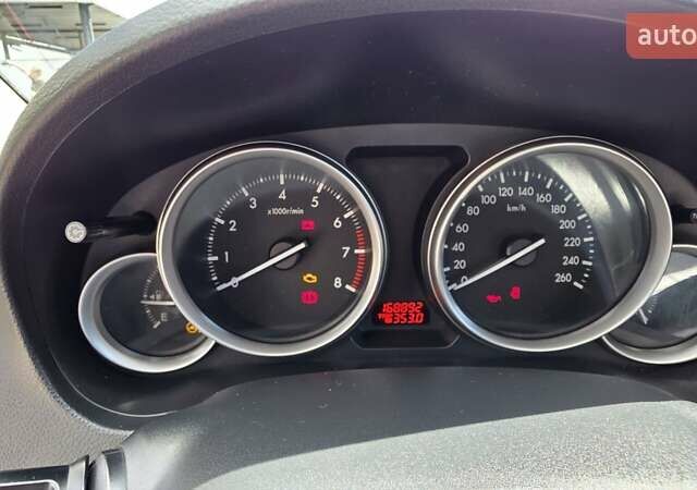 Белый Мазда 6, объемом двигателя 2 л и пробегом 167 тыс. км за 7800 $, фото 16 на Automoto.ua